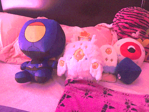 v1, angels, eyeball and ramiel plushies on my bed