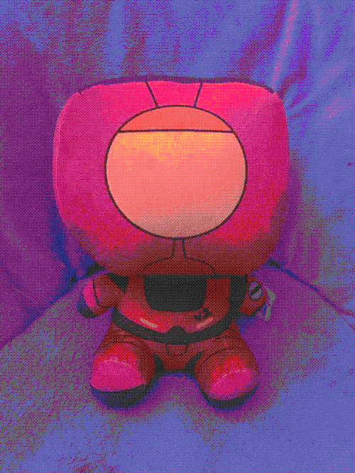 v2 plushie on my purple chair